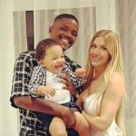 William Carvalho with his son and girlfriend