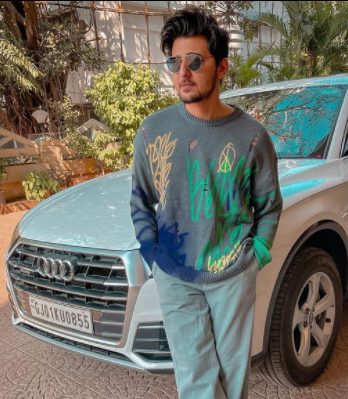 Darshan Raval with his Audi car