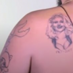 Josh Ostrovsky tattoo back