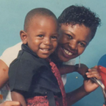 Kendrick Lamar with his mother Paula Oliver in childhood