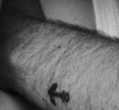 Sam Smith's left hand tattoo