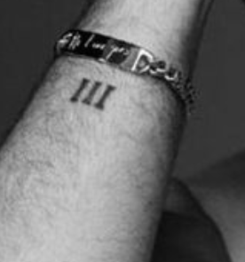 Sam Smith's right hand tattoo