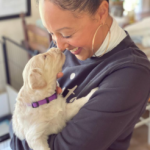 Tamera Mowry with her pet dog