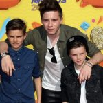 Brooklyn Beckham with his brothers