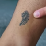 Ethan Dolan Tattoo on right leg