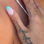 Francesca Farago's right hand fingers tattoos