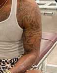 HaHa Davis Tattoo on left hand