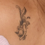 Janel Parrish Tattoo on back