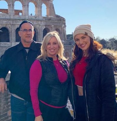 Laci Kay Somers with her father and mother