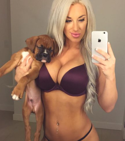Laci Kay Somers with her pet dog
