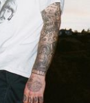 Mac Miller Tattoo on left hand