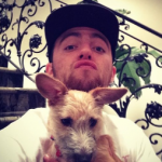 Mac Miller with his pet dog