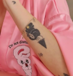Marzia Kjellberg tattoo on left hand