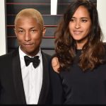 Pharrell Williams with his girlfriend Helen Lasichanh