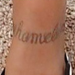 Remy Ma Tattoo on left leg