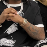 Rich The Kid Tattoo on left hand