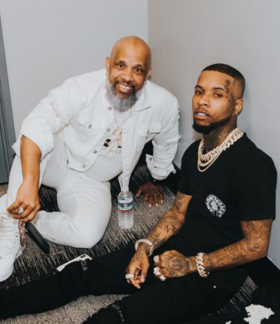 Tory Lanez with his father Sonstar Peterson