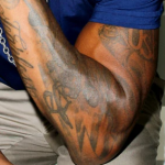 Usher Tattoo on left hand