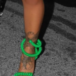 Alexis Skyy's left leg tattoos