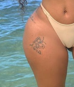Alexis Skyy's right thigh tattoos