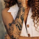 Andrea Russett's right hand tattoos