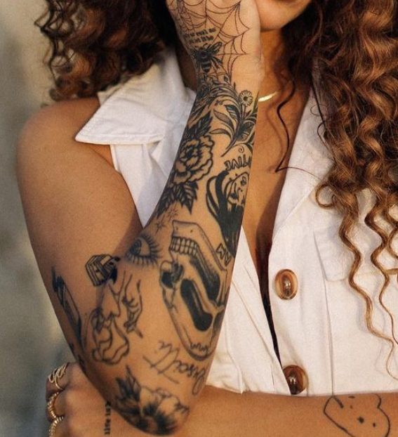 Andrea Russett's right hand tattoos
