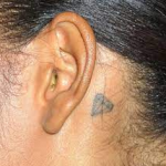 Angela Simmons Tattoo behind ear