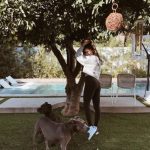 Daniella Monet with her pet dogs