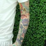 Lary Over's left hand tattoos