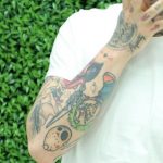Lary Over's right hand tattoos