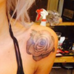 Lou Teasdale Tattoo on left shoulder