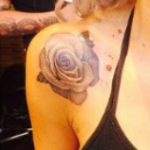 Lou Teasdale Tattoo on right shoulder