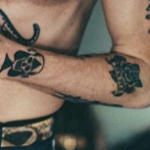 Macklemore Tattoo on left hand