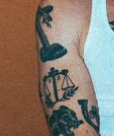 Macklemore Tattoo on right hand