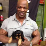 Ronnie Coleman with his pet dog