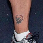 Steve Austin Tattoo on leg