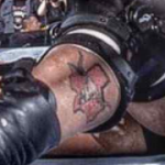 Steve Austin Tattoo on leg pic