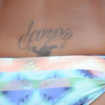Eva Marcille Tattoo on lower back