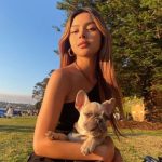 Lily Maymac with her pet dog--