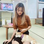 Lily Maymac with her pet dog-