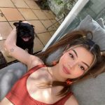 Lily Maymac with her pet dog