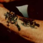 Ozzy Osbourne Tattoo on hand-
