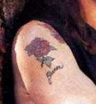 Ozzy Osbourne Tattoo on right hand