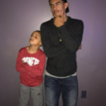 Trae Young with his brother Timothy Young