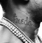 YFN Lucci Tattoo on neck