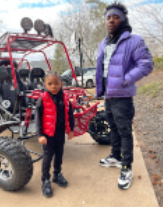 YFN Lucci with his son Justice