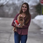 Nikki Roumel with her pet dog -