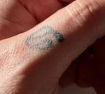 Pooja Bhatt Tattoo on finger
