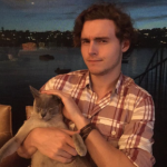 Callan McAuliffe with his pet cat