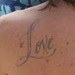 Keith Urban Tattoo on back-